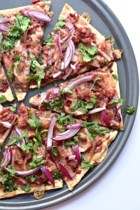 Cranberry BBQ Pizza made with shredded hearts of palm and Flatout pizza bread
