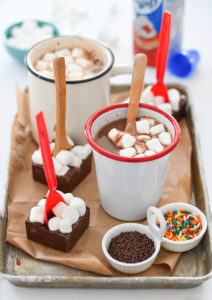 A tray of hot chocolate with marshmallows