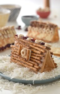 So simple to make and requiring a sturdy layer of dairy free cream cheese to hold them together, these Savory Cracker Gingerbread Houses are healthier than their traditional sugary gingerbread house counterparts and don't require half of the patience of putting together.