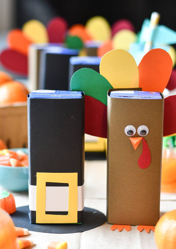 A side-by-side of turkey and pilgrim hat-themed Thanksgiving Juice Boxes