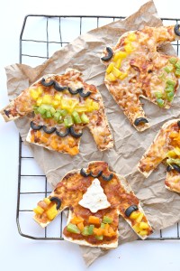 Throw an Ugly Sweater Pizza Party this Christmas using FlatOut's artisan pizza crusts and a sweater cookie cutter!