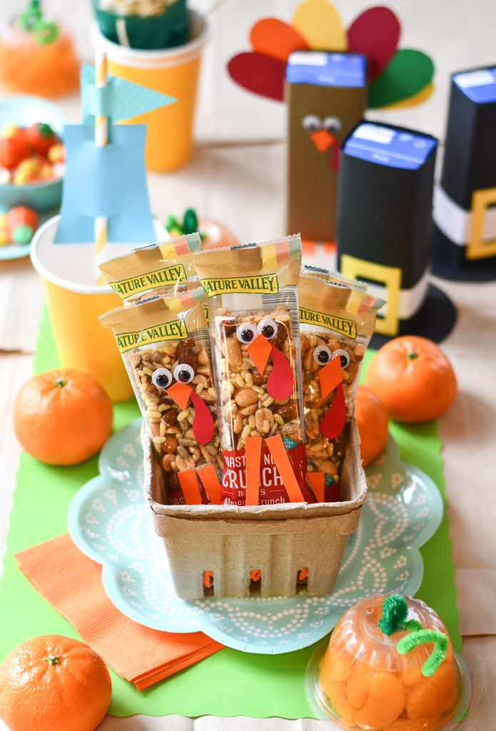 A thanksgiving kid's table with a basket of Turkey Granola Bars