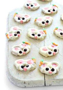 A gluten free pretzel dipped into vegan white chocolate makes these Easter Bunny Pretzels oh-so adorable!